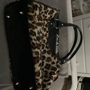 Lux de ville leopard print hand bag.